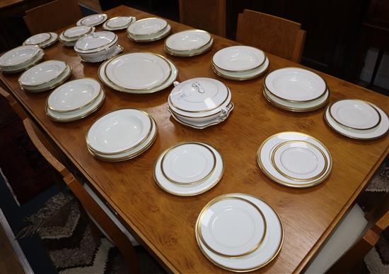 A Minton dinner service with gilt decorated Greek Key pattern edge, including similar Worcester, Doulton and Tuscan ware